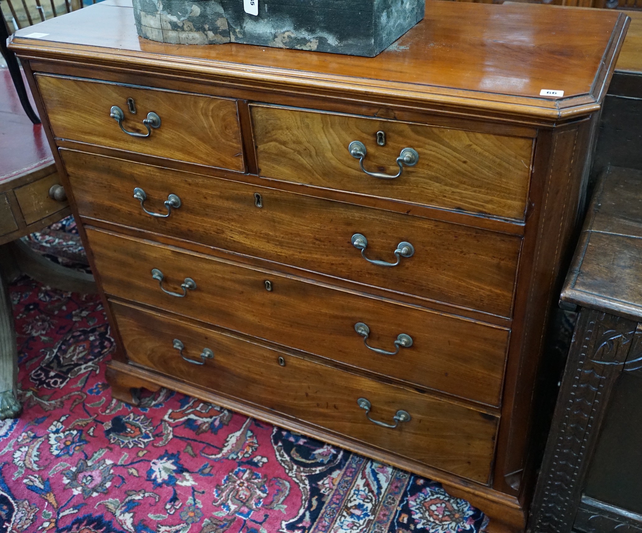A George III mahogany chest of two short and three long drawers, width 118cm, depth 55cm, height 106cm